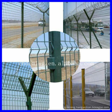 Airport security fence with Y post and barbed wire